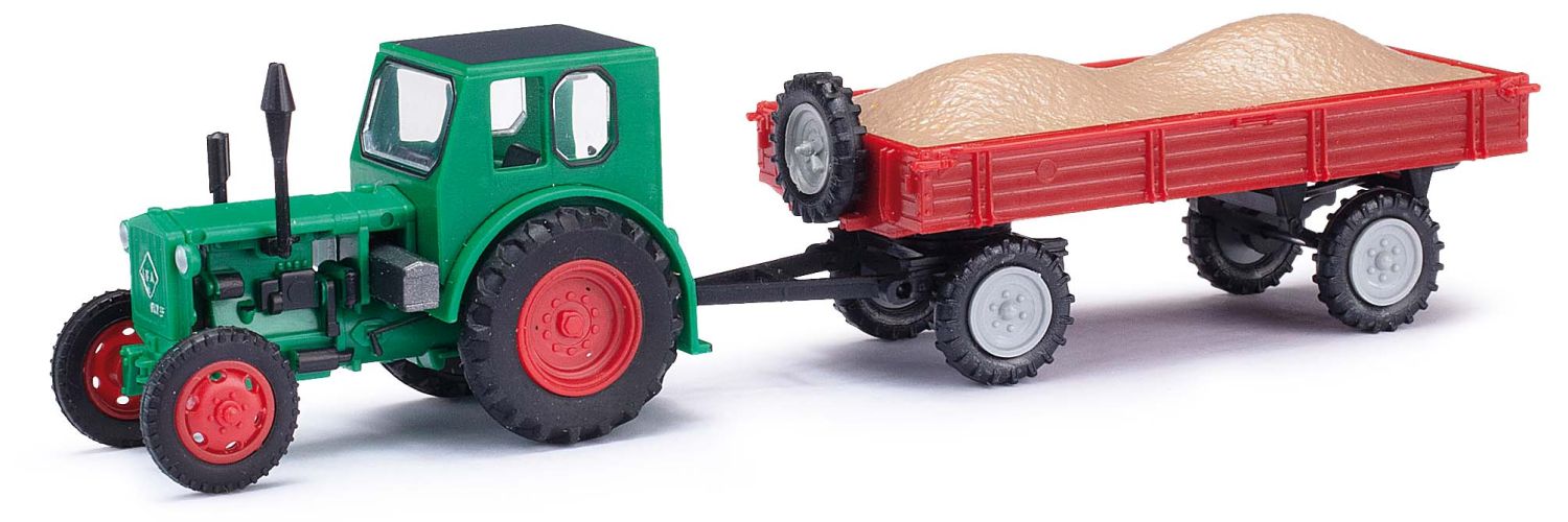 Busch 210006422 - Traktor Pionier mit Anhänger und Kiesladung