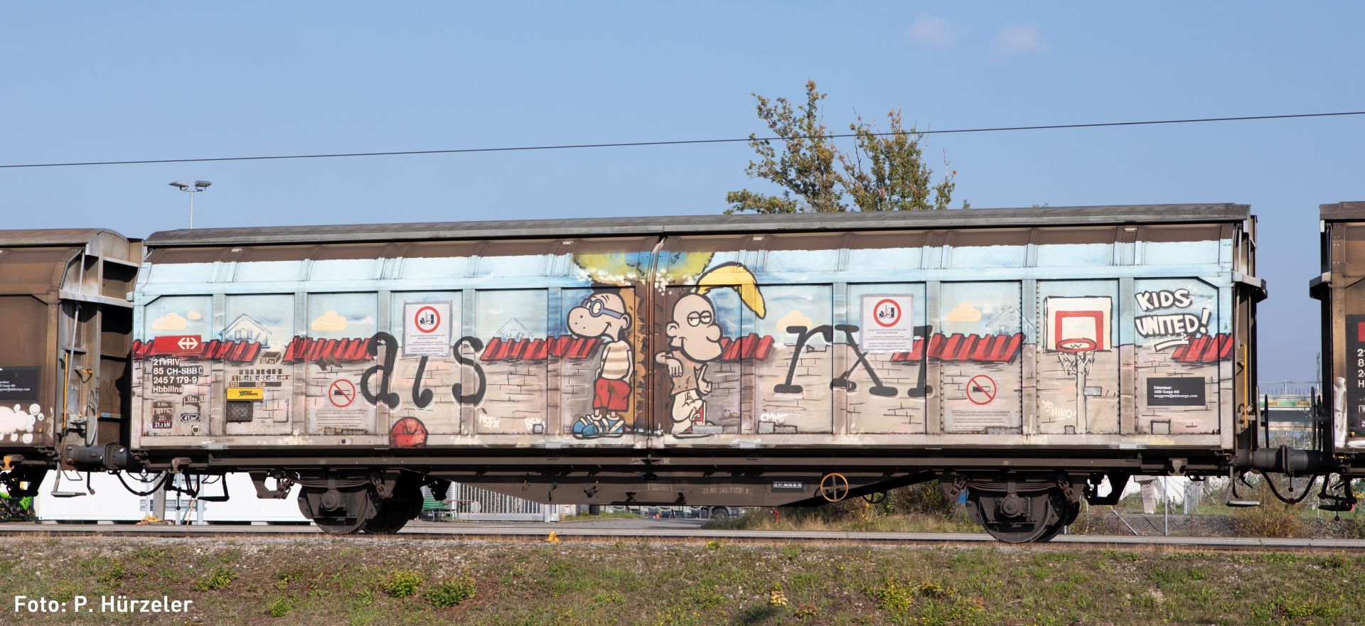 Hobbytrain H24663 - Schiebewandwagen Hbbillns, SBB, Ep.VI, Graffiti 'Kids United'