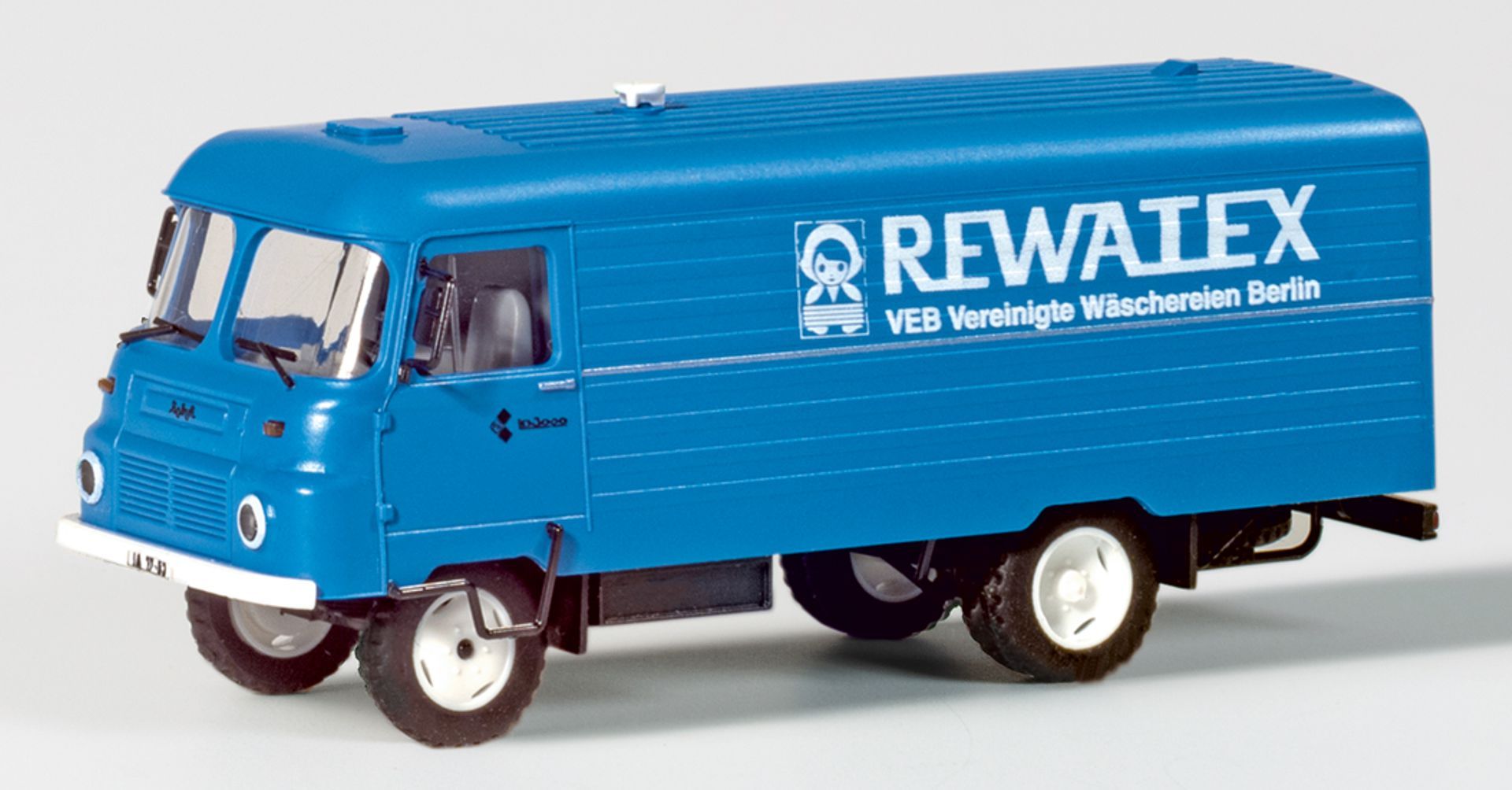 Modellino Auhagen MiniCar Robur LO3000 Furgone Rewatex &ndash; Scala 1:120 (66049) &ndash; NUOVO