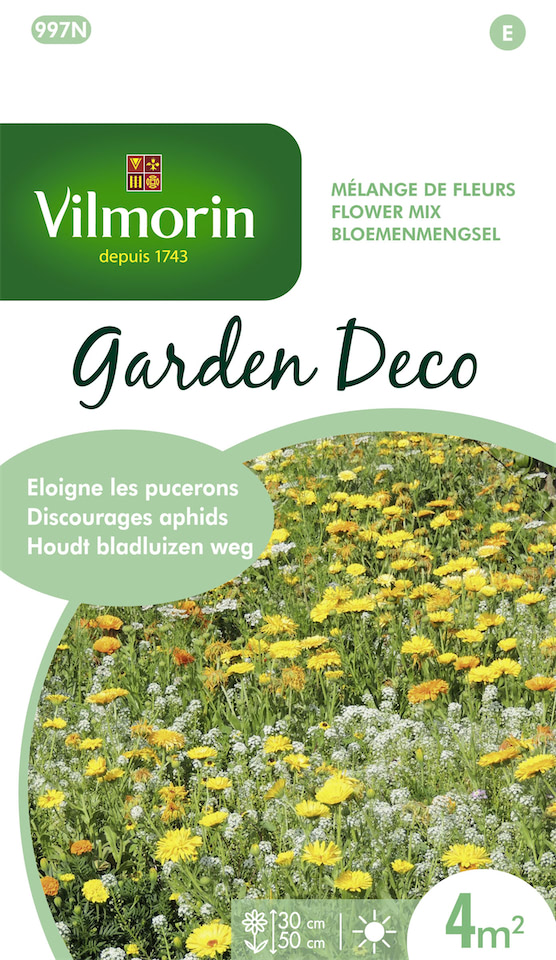 Een kleurrijk veld met verschillende bloemen en kruiden, gekweekt uit het Vilmorin Garden Deco bloemenmengsel, dat helpt bladluizen op natuurlijke wijze weg te houden.