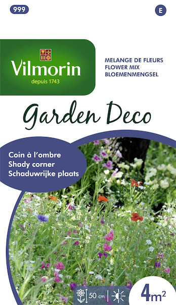 Een kleurrijk veld met verschillende soorten bloemen die geschikt zijn voor schaduwrijke plekken, gekweekt uit het Vilmorin Garden Deco bloemenmengsel.