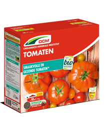 Rode verpakking van DCM Organisch-Minerale Meststof voor Tomaten, met afbeelding van rijpe tomaten.