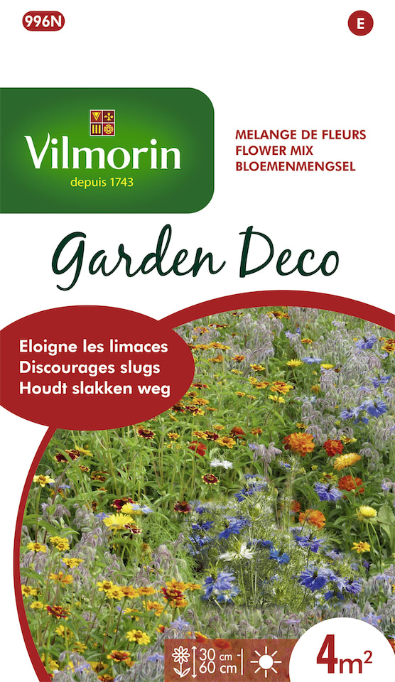 Een kleurrijk veld met verschillende bloemen en kruiden, gekweekt uit het Vilmorin Garden Deco bloemenmengsel, dat helpt slakken op natuurlijke wijze weg te houden.