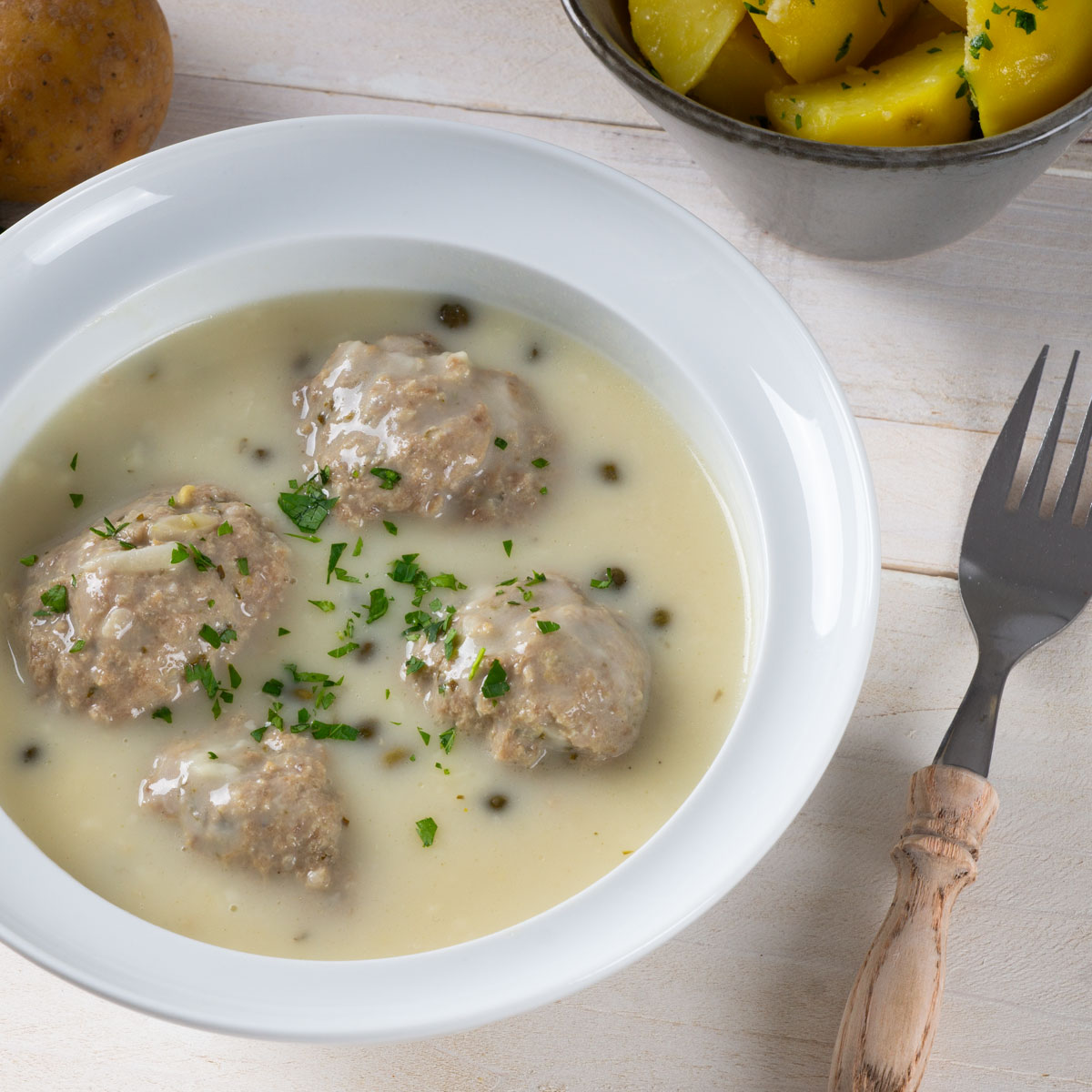 Königsberger Klopse (Meatballs with white sauce and capers)