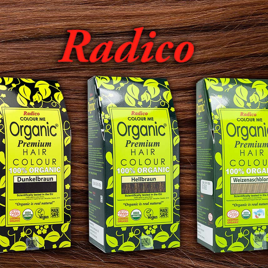 Text: Holzhintergrund, darf drei Packungen Premium Haarfarbe von Organic und der Überschrift " Radico".