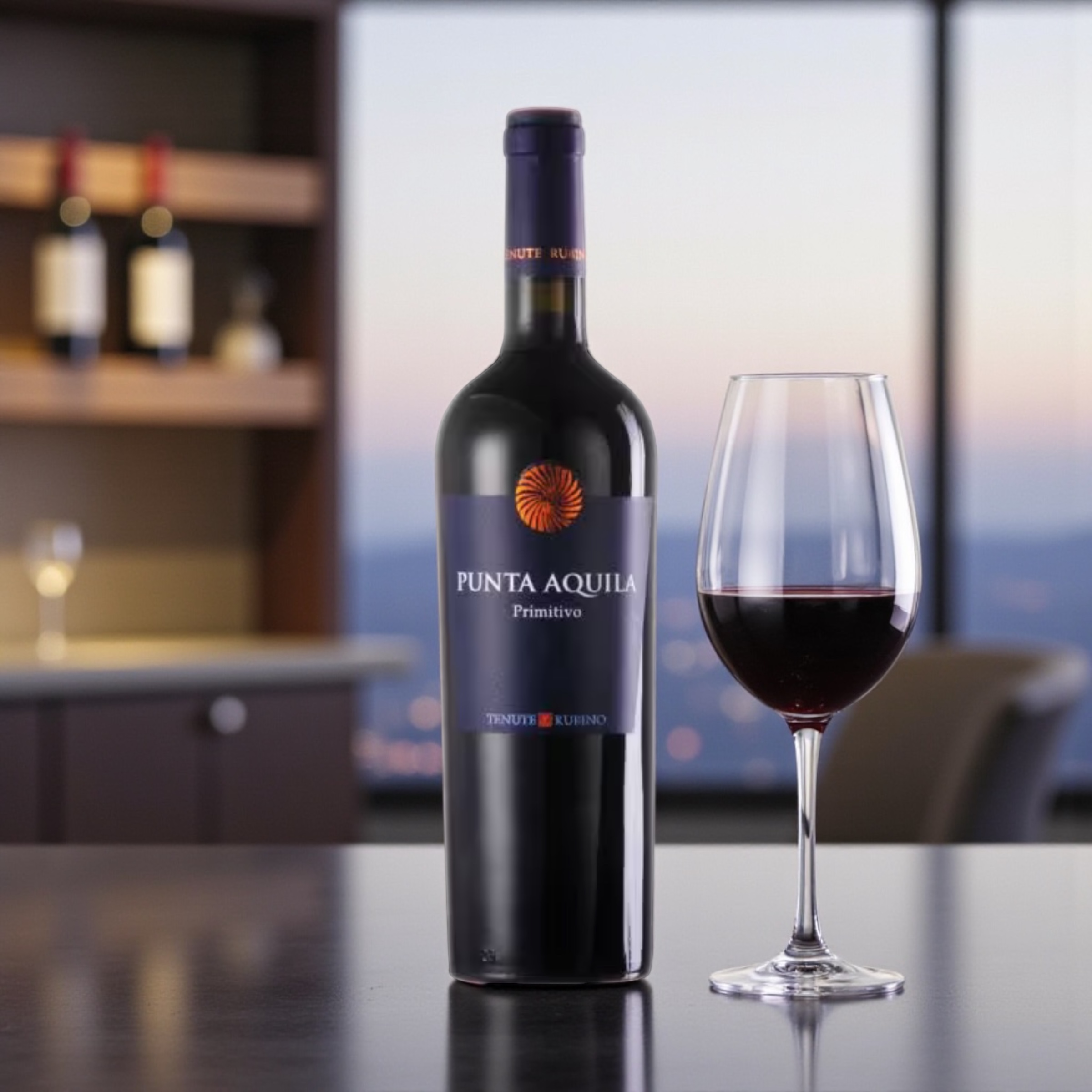 Punta Aquila Primitivo auf einem Tisch mit Glas