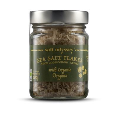 Sea salt flakes with oregano in a glass jar 100g