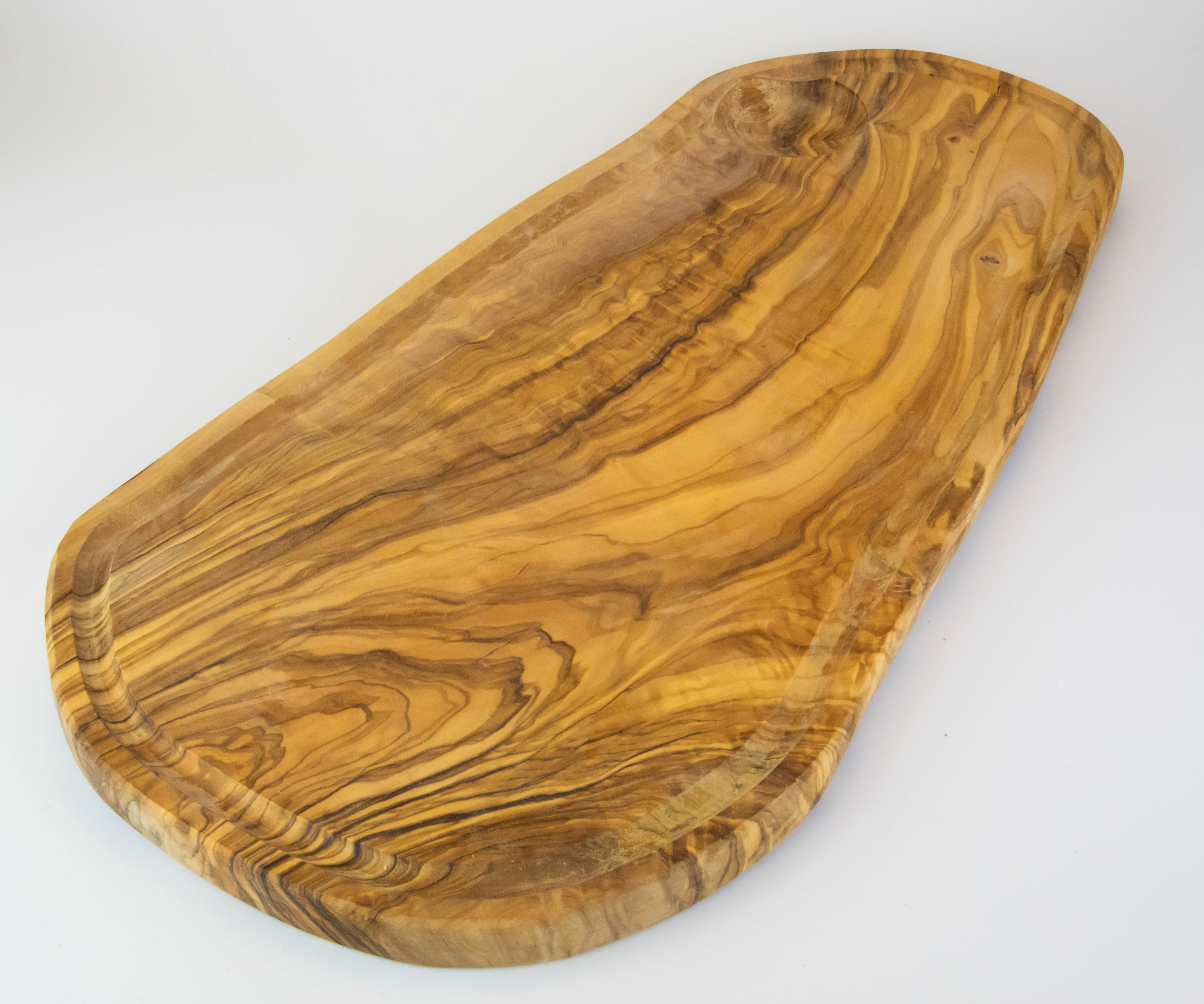 Rustic cutting board made of olive wood