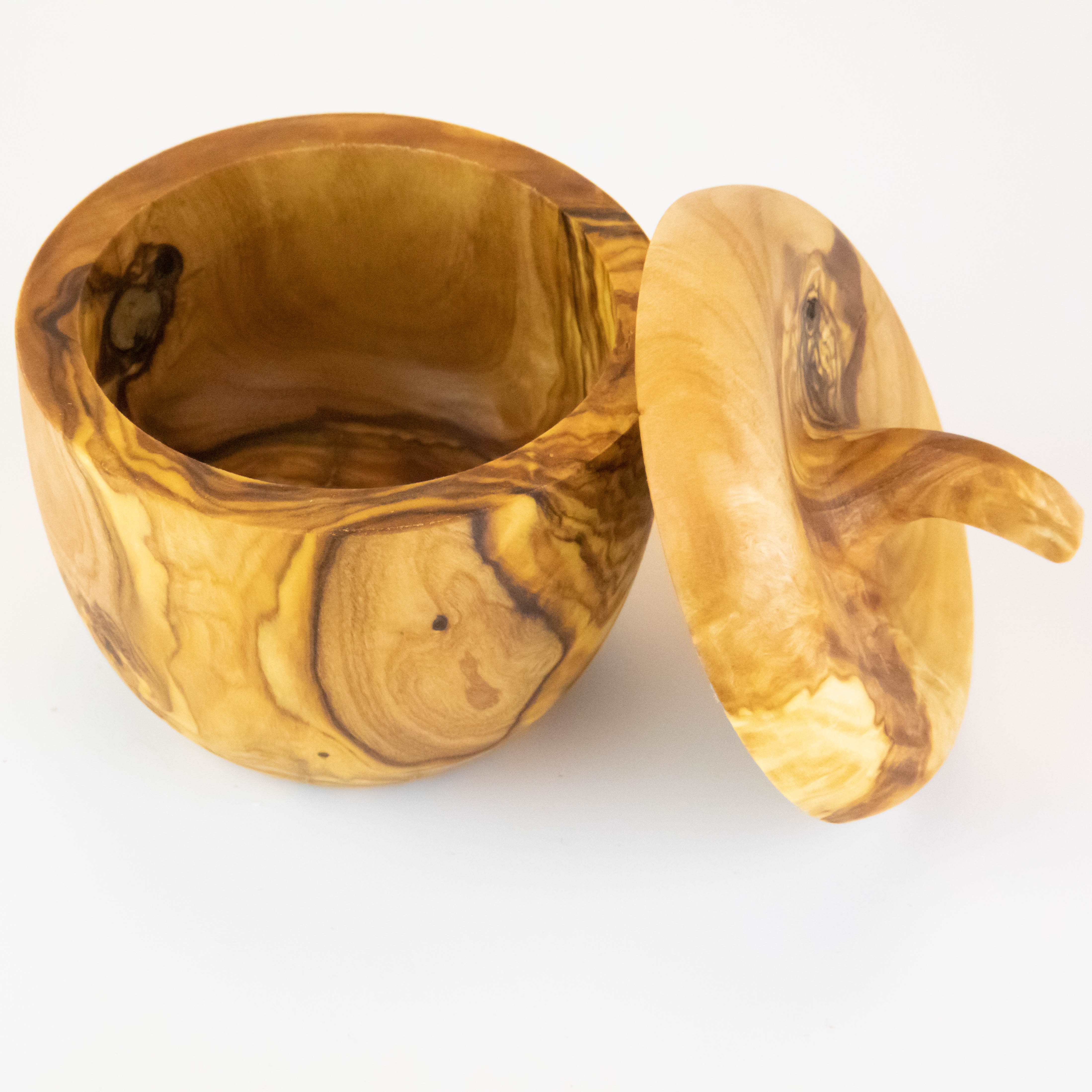 Sugar bowl made of olive wood with pointed lid.