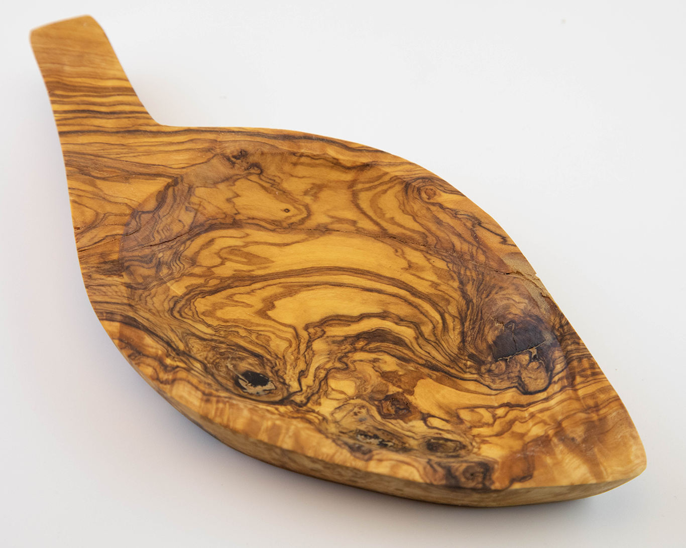 Plato de madera de olivo en diseño de hoja de 22x10 cm.