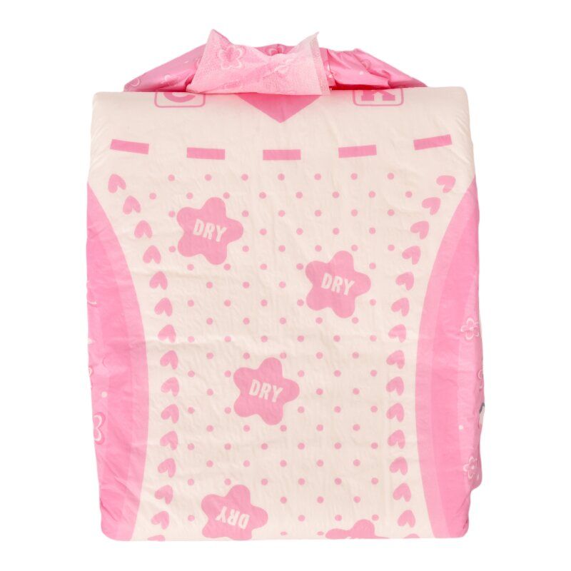 Eine rosa Windel mit einem Muster aus Sternen und Punkten. Die Worte -DRY- sind mehrmals sichtbar. Die Windel hat eine glatte Textur und einen leicht gefalteten oberen Rand.