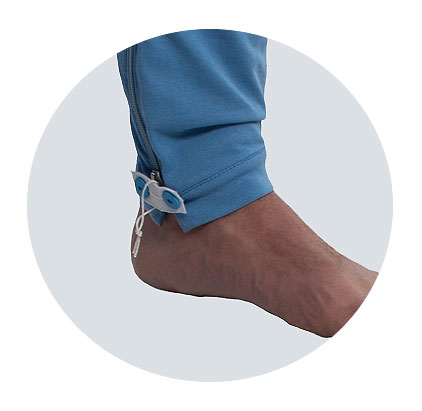 Pflegeoverall - Beinsicherung