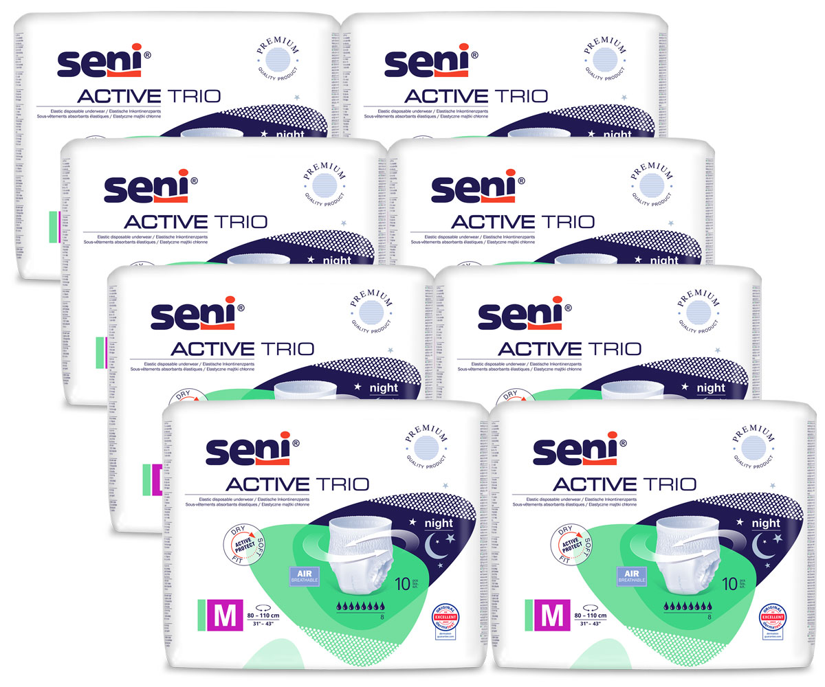 Seni Active Trio Pakete sind im Vordergrund angeordnet, jeweils mit einem Design in Blau und Grün. Auf den Verpackungen steht -Premium Quality Product- sowie die Größenangabe -M-. Die Produkte sind für Nachtgebrauch ausgelegt.