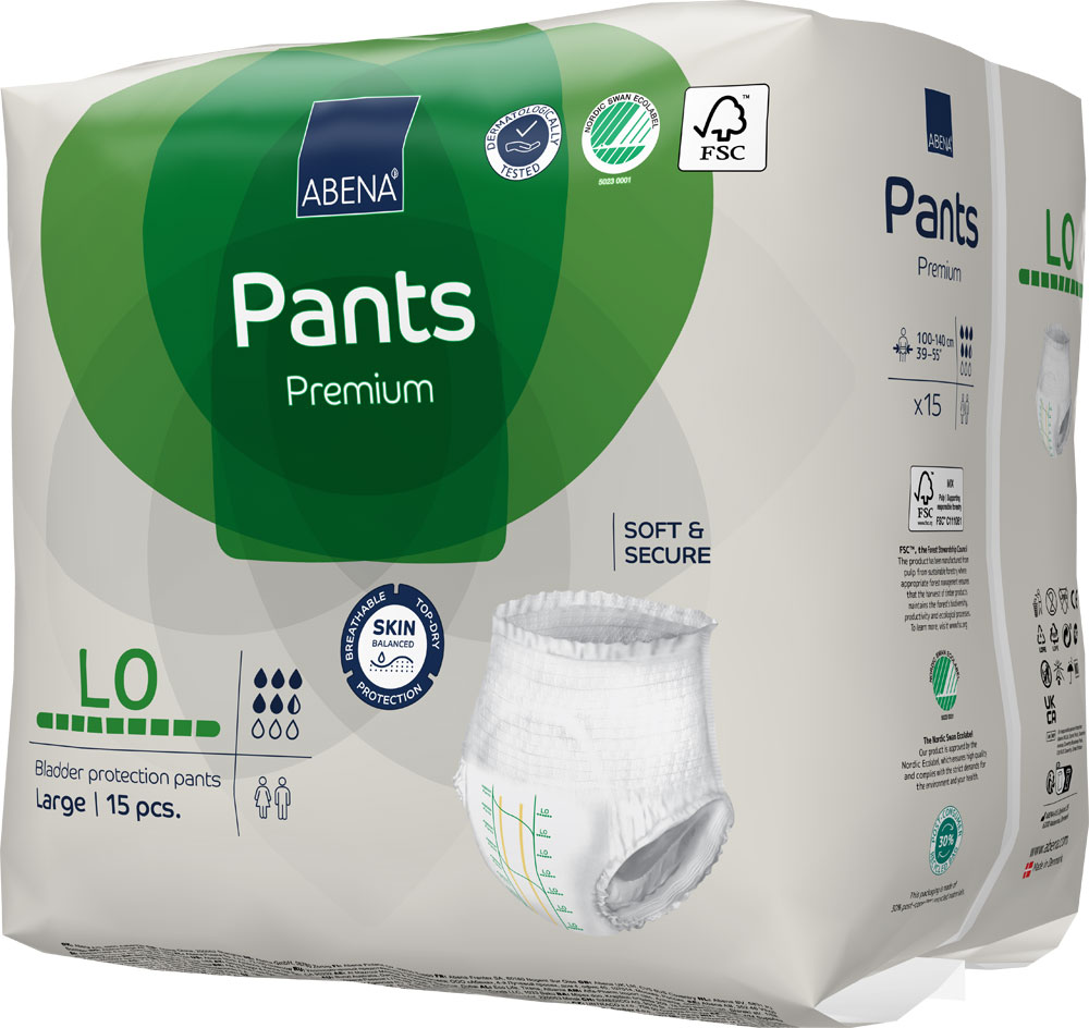 Blasenschutz-Hosen in einer Verpackung, die 15 Stück enthält. Die Hosen sind weich und sicher, mit einer gelben Skala zur Größenangabe. Verpackung hat grüne und weiße Farben, enthält Umweltzeichen.